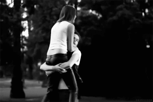 boy carries girl